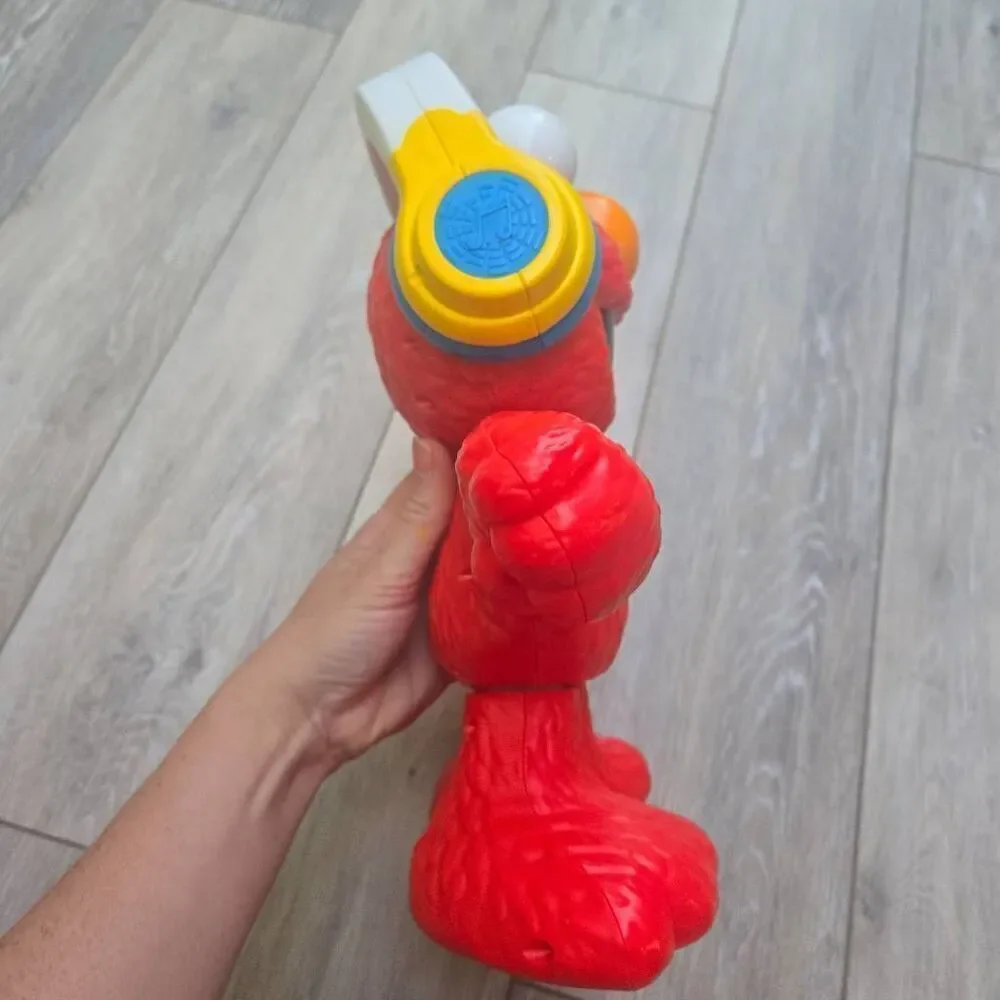 Sesame Street Let's Dance Elmo: 12-inch Elmo Toy Sings Sesame Street Toy for Kid